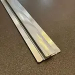 Perfil de aluminio Unión T para láminas marmoleadas 2.3cm x 290cm